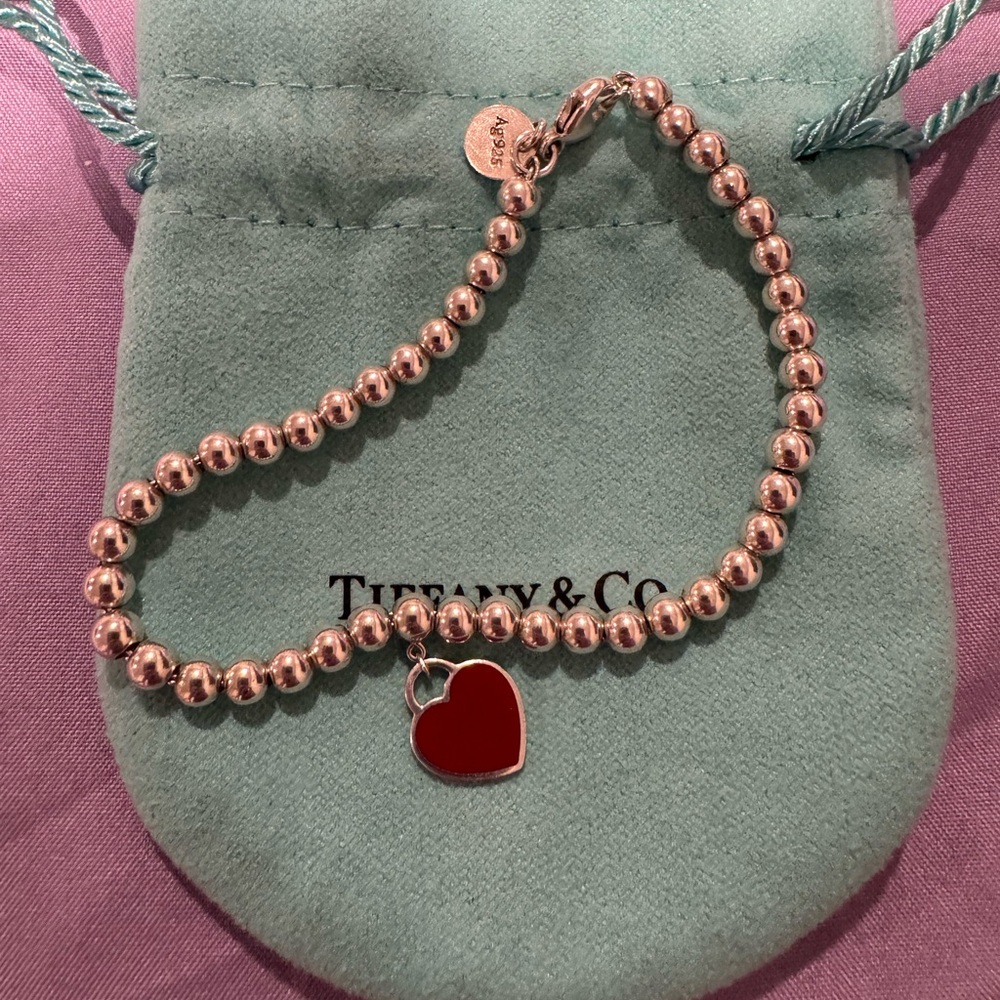 Tiffany & Co. Silver Beaded Bracelet with Red Heart Charm